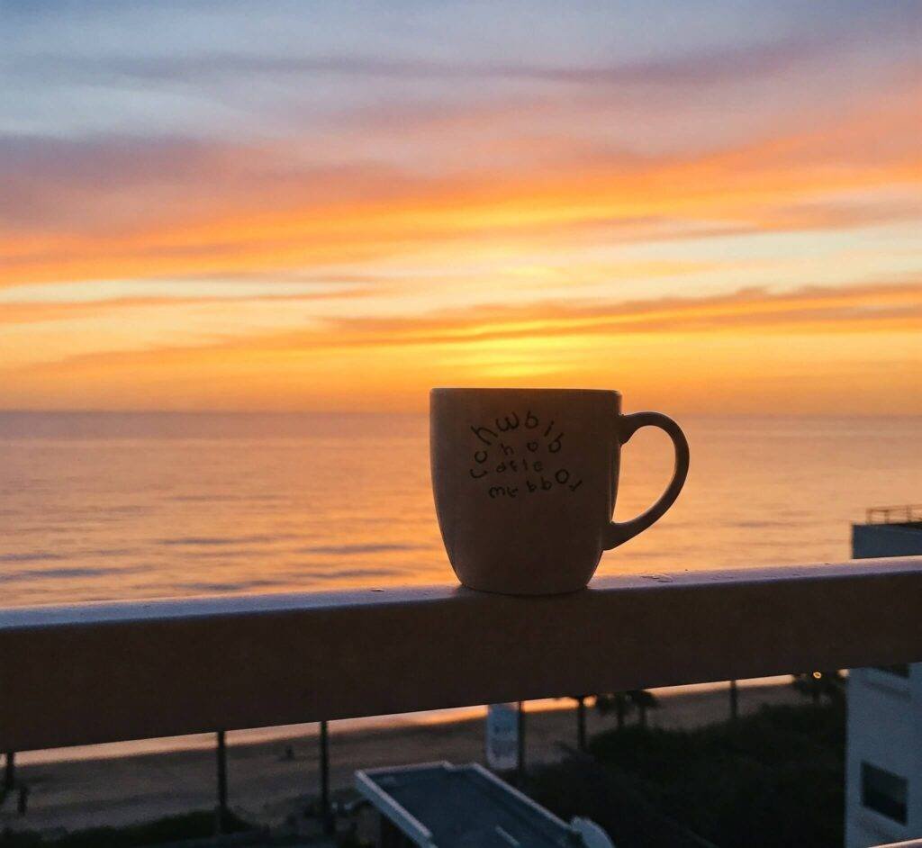 coffee mug and the soft sunrise colors